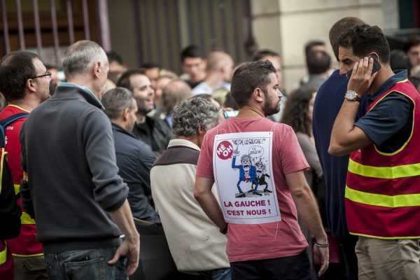 LILLE, FRANCE – JULY 4: Some activists working against the law gathered outside the entrance to the gym with placards and slogans against the government policy in Lille, France on july 4.
Supporters of the policy of the socialist government, led by Stéphane Le Foll and Patrick Kanner in the region held a meeting Monday night in Lille Gym, to restore confidence to the militants and provide them with arguments.