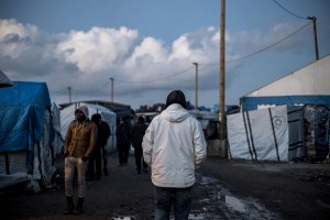 A man walks alone in the main street of the Jungle.
In Calais, northern France, February 23, 2016 